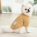 Yellow cable-knit dog polo shirt with Happy Bear patch worn by a white Pomeranian - Yellow Wool Sweatshirt