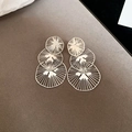 Detailed macro shot of triple-layered golden earrings with sunburst hollow pattern - Three-layer Round Hollow Drop / Silver