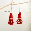 Set of two red knitted Christmas doll ornaments with wood buttons, approx 7cm height - Two-Piece Set / Red Button Girl