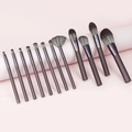12-piece professional makeup brush set in dark brown displayed on pink background - 12Pcs Coffee Color Set