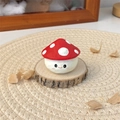 Macro shot of hand-carved mushroom desk ornament with a cute smiley face on wood base - Mushroom Hat Tuan Tuan (Small) / Height approx 4cm