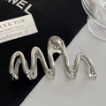 Polished silver metal hair claw clip with a wavy design and high-shine mirror finish - Large Silver M-Shape