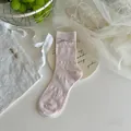 Calcetines rosa claro estilo ballet con lazo en un plato decorativo de cerámica - Talla única / Rosa Claro