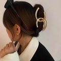 Elegant gold-plated metal shark clip in a geometric design worn on a bun hairstyle - Geometric Interlaced Double Arc Style / Medium / Gold