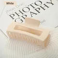 Minimalist matte cream white square claw clip for thick hair shown on a wavy tray - White