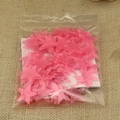 Set di adesivi murali fluorescenti rosa a forma di stella su sfondo di juta naturale - Versione spessa/Confezione da 100 pezzi / 3cm/Luminoso / Rosa