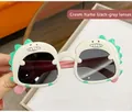 Kids dinosaur sunglasses with beige frame, grey lenses and vibrant pink temples - Off-white