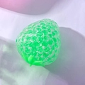 Fluorescent green strawberry squishy toy with white foam beads for stress relief - Crystal Strawberry Green