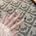 French lace style press-on nails in nude pink with black bows and almond shape design - S113 Lace Tie Style (30 Pcs)