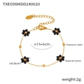 Detalle de pulsera de margaritas en acero de titanio chapado en oro 18k con piedras negras - Pulsera de Oro