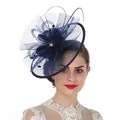 Detailed view of elegant navy blue fascinator hat with veil, feathers and beads - Navy Blue