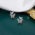 Elegant silver butterfly earrings with sparkling cubic zirconia on green background - Silver White Double Layer Diamond Butterfly Stud Earrings(E2942-2)