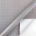 Floral gift wrapping paper in neutral grey with small colorful patterns, roll view - Style 6 (Grey Floral)
