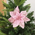 Pink glitter artificial Christmas flower decoration on green tree branches - Glitter