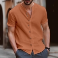 Détail rapproché d'une chemise homme en lin à manches courtes avec boutons vintage et col henley - S / Hauts / Orange