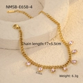Detailed view of golden chain bracelet with pink teardrop gemstones and lobster clasp - Water Drop Pink Zirconia