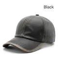 Casquette vintage en cuir noir avec texture grainée et finitions marron effet vieilli - Noir