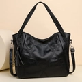 Bolso tote minimalista de cuero negro suave con asas trenzadas y detalle de borla elegante - Negro
