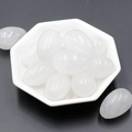 Set of 12 white quartz egg-shaped stones in a hexagonal ceramic plate for decoration - Clear Quartz (1pc)