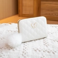 Elegant white quilted coin purse with gold butterfly detail and fluffy pompom charm - White