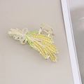 Close-up of golden wheat ear hair claw clip with yellow rhinestones and green enamel leaves - Large Wheat Claw-Full Rhinestone Style / Bulk Packaging
