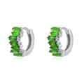 Macro view of silver huggie earrings featuring emerald green rectangular zircons - Green (Platinum Plated)