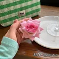Pink rose flower hair clip with gradient petals 8cm size shown in hand-held view - Pink Rose Hair Clip