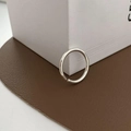 Detail of 925 sterling silver minimalist pearl ring on premium brown leather surface - Smooth Polished Open Ring (J2824)