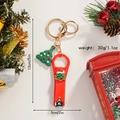 Detailed view of red Christmas tree nail clipper keychain with dimensions 5x2 inch - Drip Oil Green Christmas Tree
