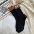 Knitted black wool socks with brown contrast cuff and decorative beige label - One Size / 452 Black