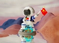 Astronaut building block pen holder with flag and blue radio on reflective base - 6043 Singer Astronaut with Light