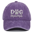 Close-up of embroidered Dog Mama text and paw print on washed purple cotton baseball cap - Purple / One Size