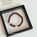 Artistic beaded bracelet with deep red agate stones and pale green jade accents - Cinnabar & Jade Bracelet