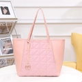 Pink quilted tote bag with diamond stitching and gold ring pendant accessory - Pink