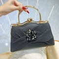 Elegant black pleated evening clutch bag with golden handle and large crystal flower - Black