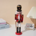 Classic wooden nutcracker soldier ornament with red uniform on a round pedestal base - 30CM Cloth Wrapped Rifle Nutcracker
