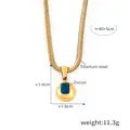 Halskette aus Titanstahl in Gold mit einem Kugelanhänger und blauem Zirkon - Gold Dezember Blauer Zirkon