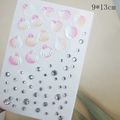 Detail view of pink iridescent shell sequins and clear rhinestones on a 9x13cm card - BJA-602 (Mermaid Shell)