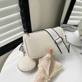 Cream white cylinder crossbody bag with checkerboard texture and wide strap - Off White