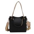 Minimalist black leather bucket bag with striped wide strap and flower charm accessory - Black