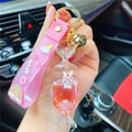 Pink unicorn liquid sand keychain with wish silicone strap and white unicorn in pendant - Pink-Fruit Candy Unicorn