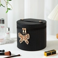 Black round PU leather makeup bag with woven texture and rhinestone butterfly detail - Adjustable LED Light / Black