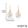 Golden Ho Ho Ho Christmas drop earrings with white enamel square charms and stud backs - HoHo Letters (D1111)
