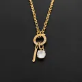 Collier élégant en acier titane plaqué or 14 carats avec pendentif en zircon brillant - Lettre L