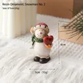 Christmas snowman resin figurine with red heart, 6cm festive tabletop decoration - Snowman No. 2