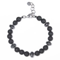 Close-up of stainless steel lobster clasp and volcanic stone beads on a bracelet - Lava Rock Bracelet