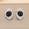 Close-up of vintage 18K gold plated geometric earrings with black cat eye stone details - Steel Black Style (KE116416-KFC)