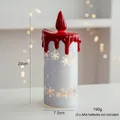 Detail view of 20cm LED Christmas candle lamp featuring gold snowflakes and red drip wax - Large Candle Light - Silver