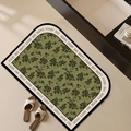 Oval retro green bathroom mat with black floral patterns and white lettered border - Large Rounded Corners / 60*90cm (Leather Look) / Dark Branch Luxury