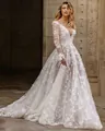 Elegant white long sleeve lace wedding dress with deep V-neck and floral embroidery - S / Dresses / White